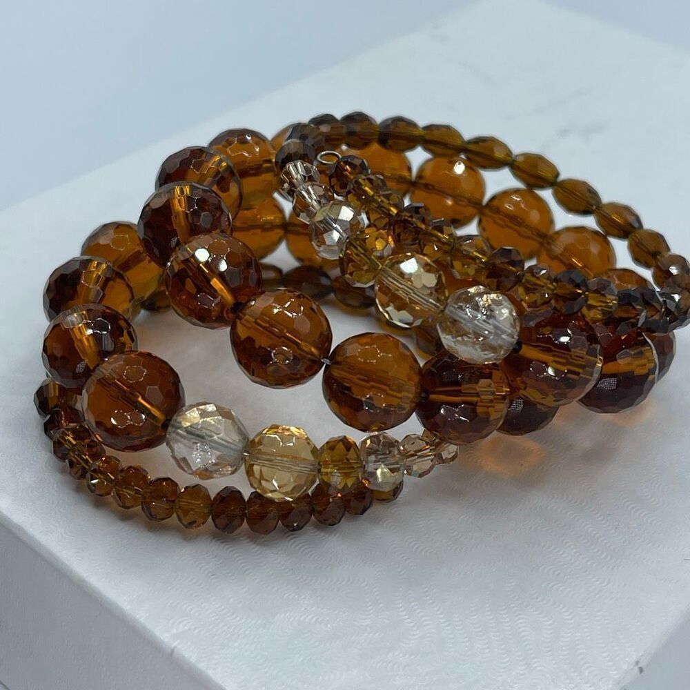Memory wire amber clear colored glass globe facetted shimmering bracelet